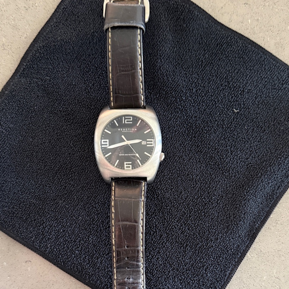 Kenneth Cole Silver and Black Leather Watch